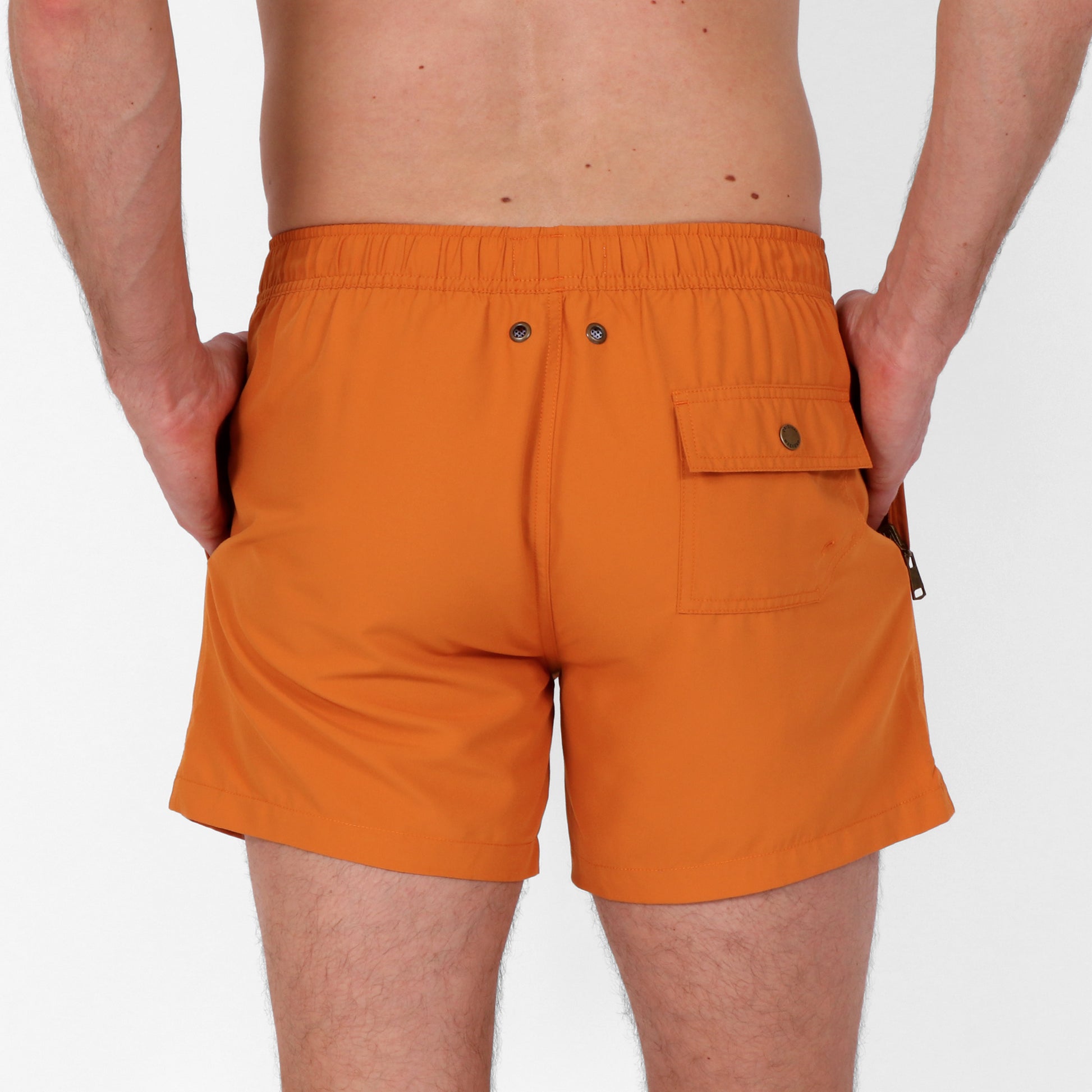 Original Weekend Sustainable Men's Swim Short in Amber Ale Orange On Body Back View
