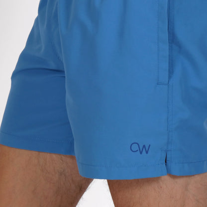 OWSS2203 AZURE BLUE SOLID COLOUR SWIM SHORT RECYCLED POLYESTER OW LOGO DETAIL