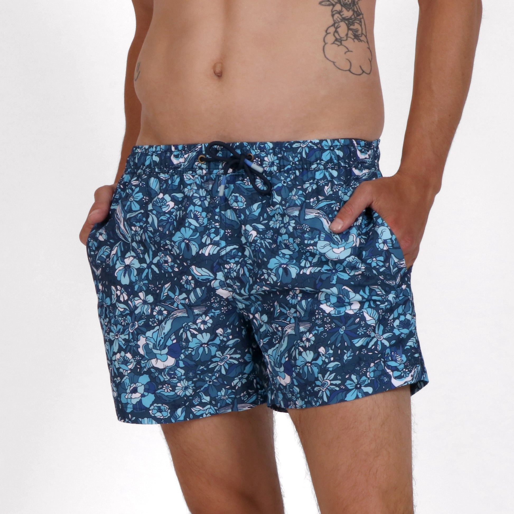 OWSS2206 WHALE OF A FLORAL PRINT MEN'S RECYCLED POLYESTER SWIM SHORT ON BODY FRONT VIEW