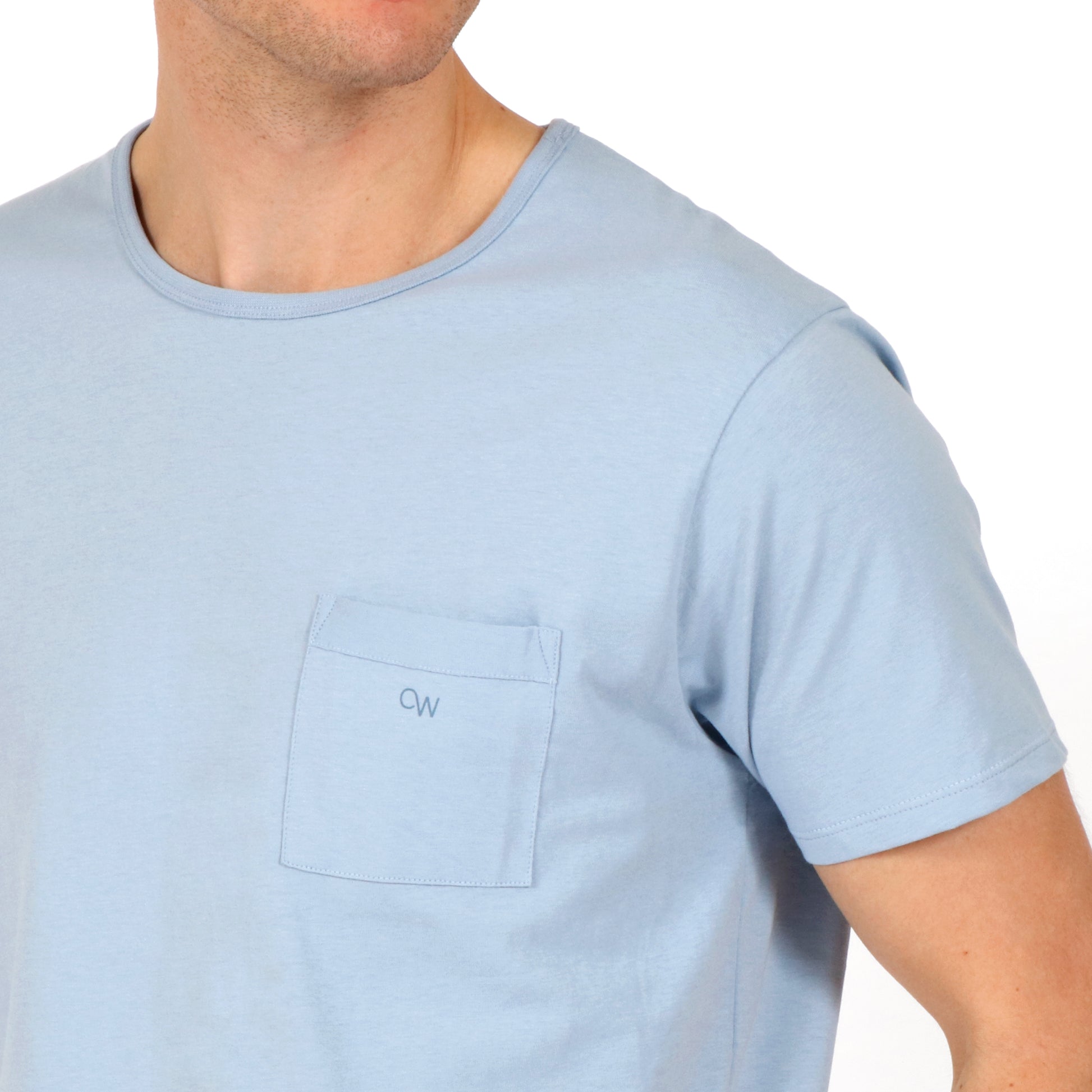 OWTS2101 Steel Fade Blue Essential Beach T-Shirt on body front pocket detail