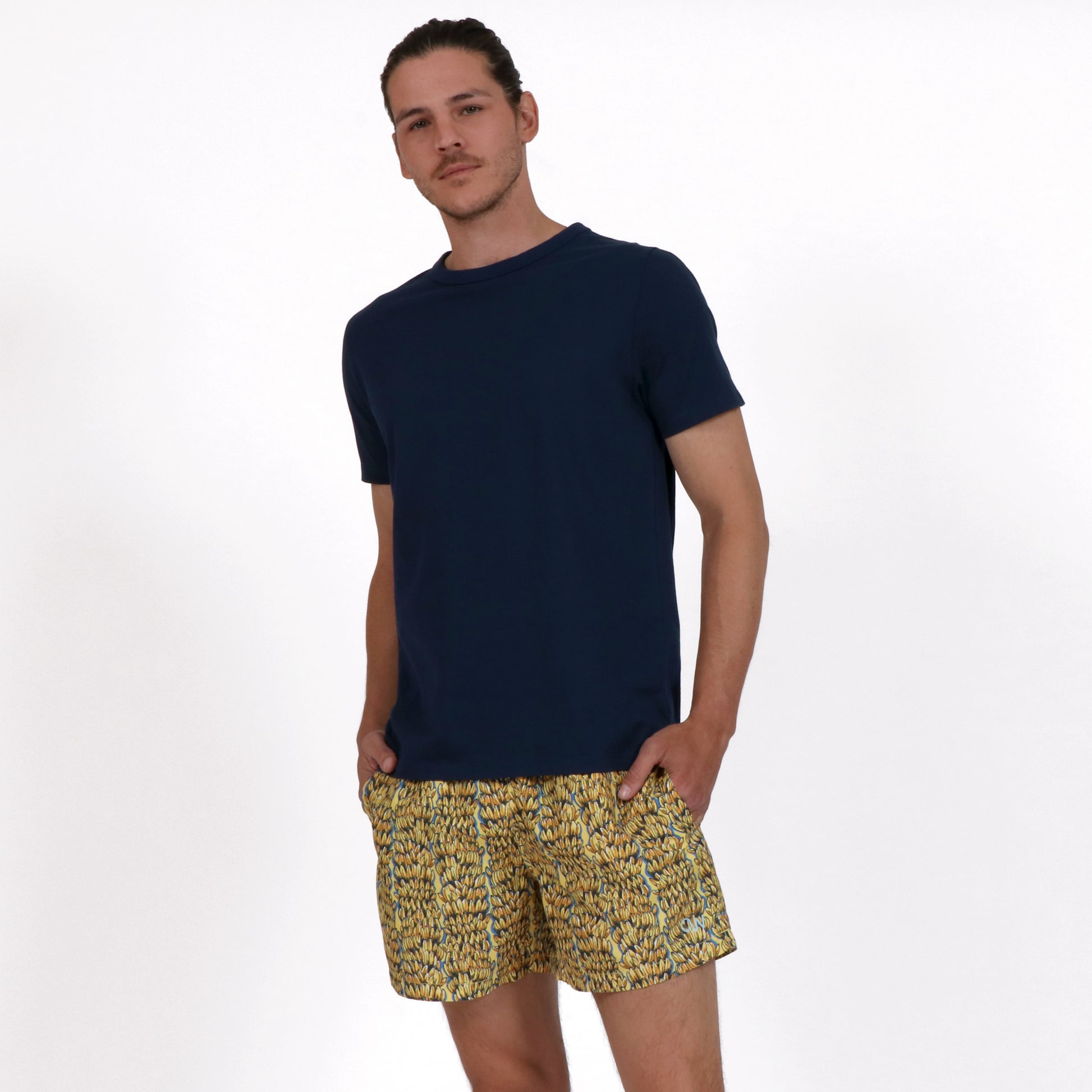 OWSS2207 GOING BANANAS PRINT SWIM SHORT RECYCLED POLYESTER STYLED WITH TRUE NAVY ORGANIC COTTON BOX FIT T-SHIRT